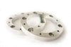A pair of steering wheel spacers is shown against a white background. Spacers are billet aluminum.