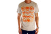 Front view of model wearing a orange on creme Get A Grip tee. The design shows a grid of steering wheels of different styles.