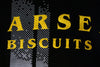 Closeup of the Larsen's Biscuits logo, and it is cropped in such a way that it reads "arse biscuits".